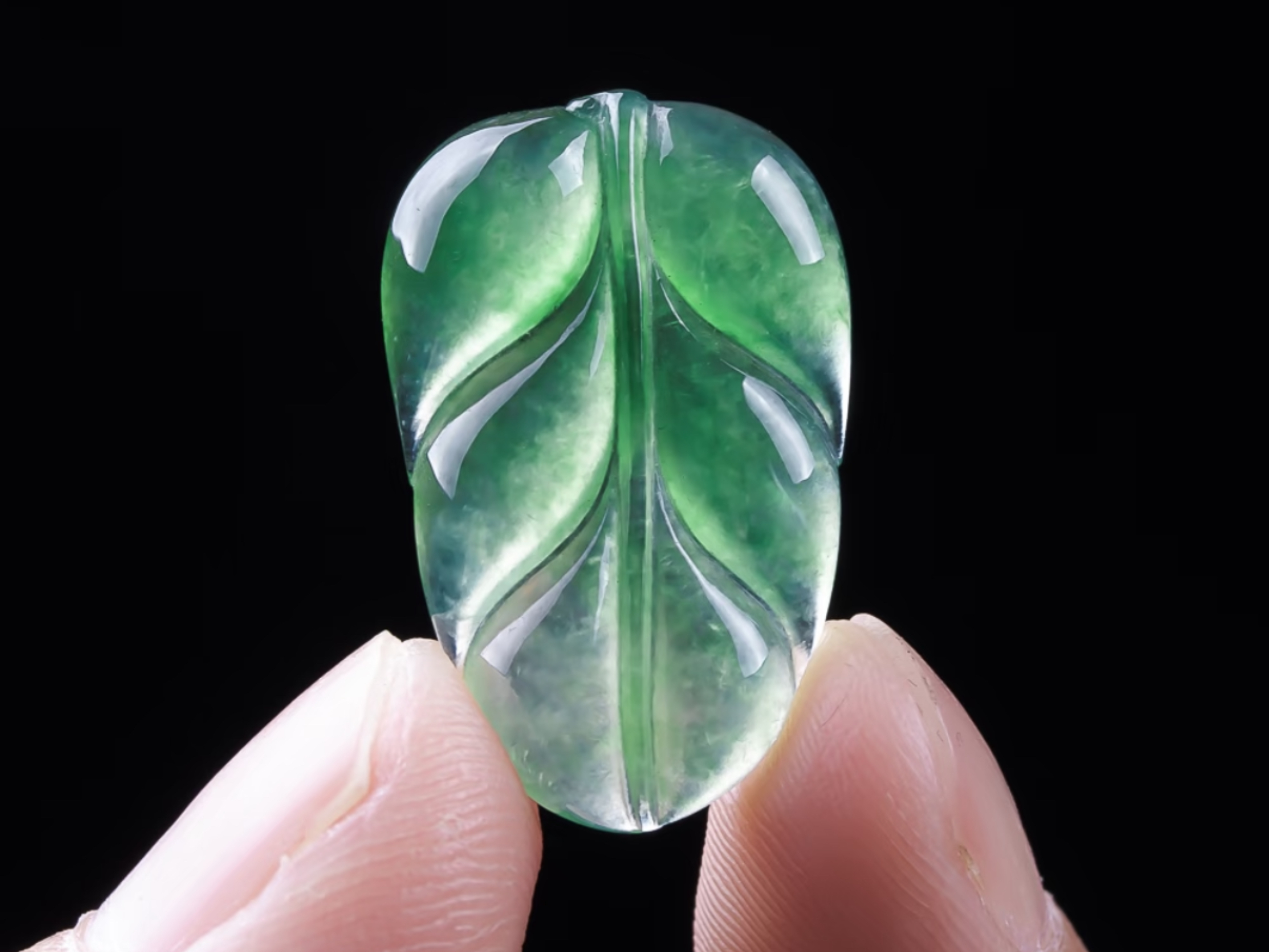 Hand-held carved jadeite leaf
